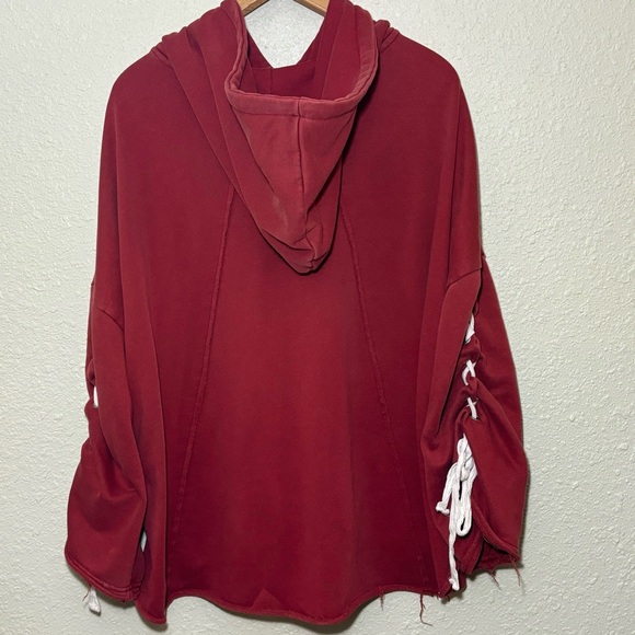 POL raw hem semi cropped hoodie with tie up sleeves in rustic red. Women’s M - Picture 6 of 7
